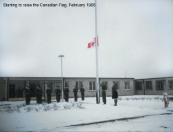 1965 February Starting to raise the new Canadian Flag